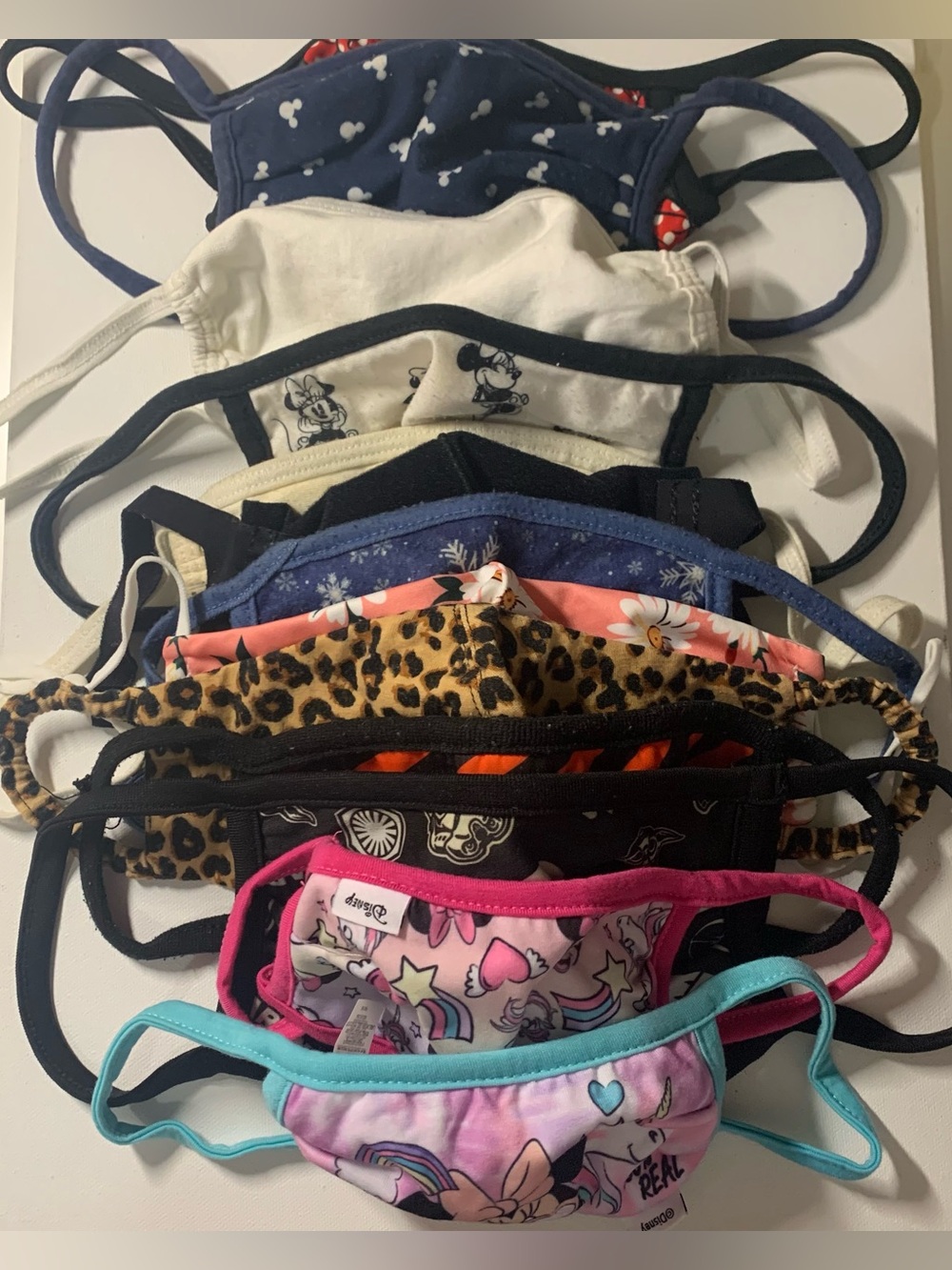 Bundle of 13 Face masks (includes brands like Disney, DGK, Star Wars)